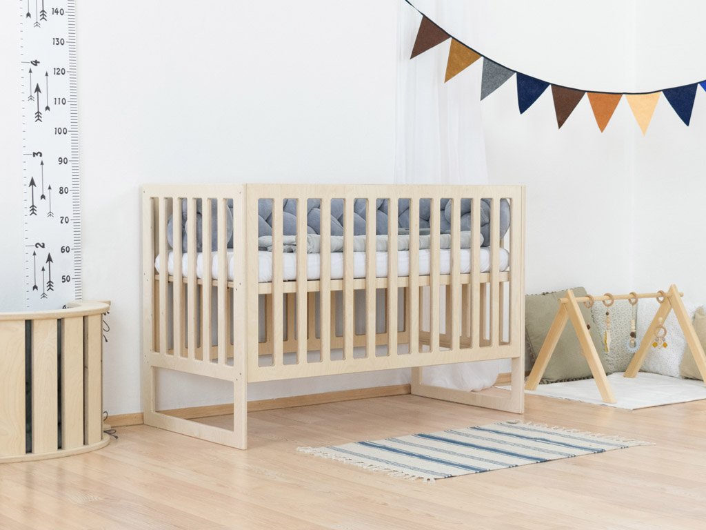 Cama para bebés con bares de pañales