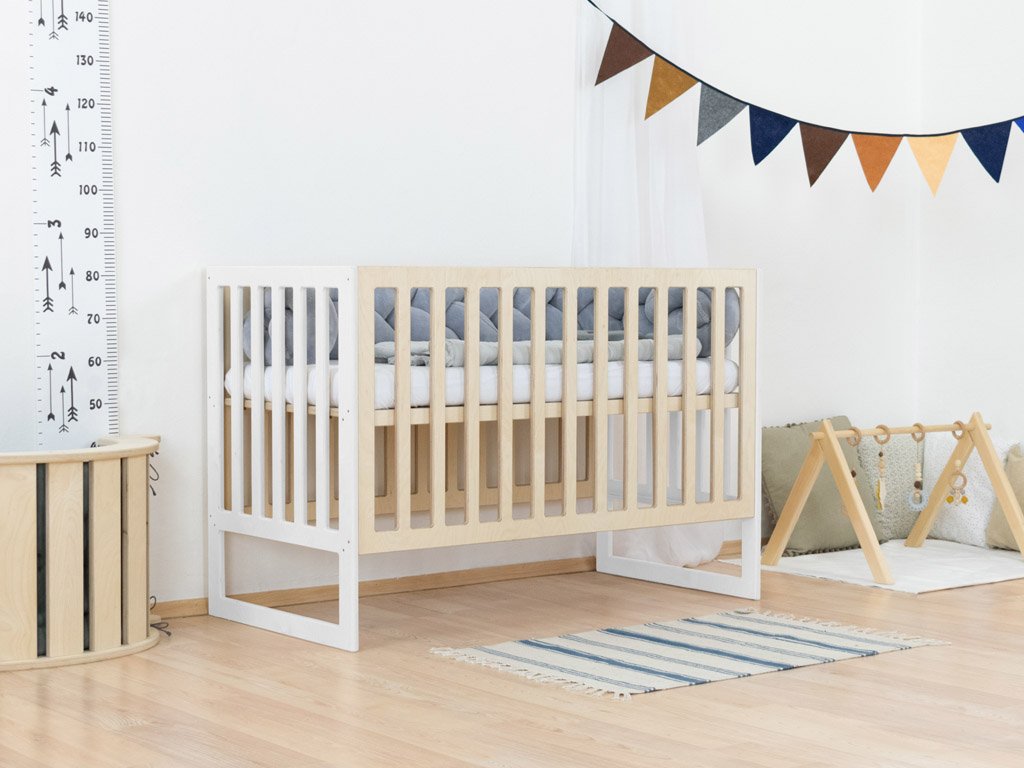 Cama para bebés con bares de pañales