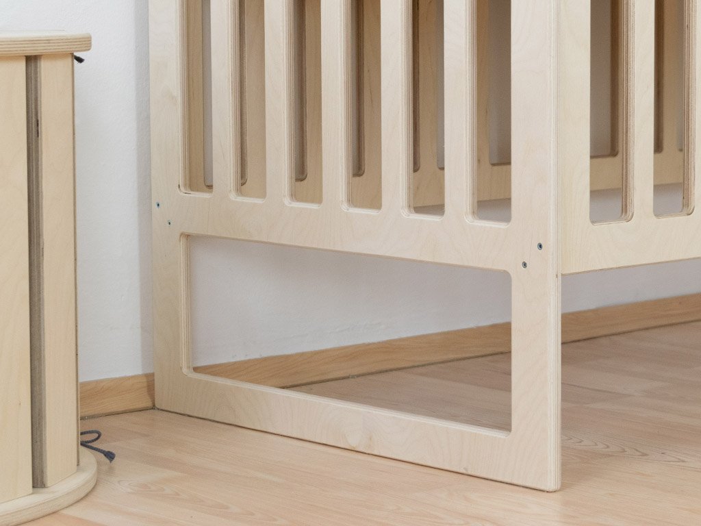 Cama para bebés con bares de pañales