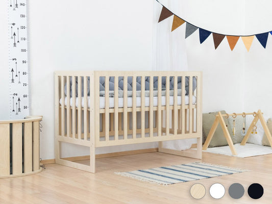 Cama para bebés con bares de pañales