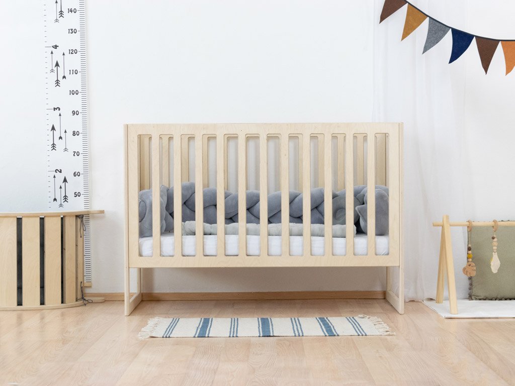 Cama para bebés con bares de pañales