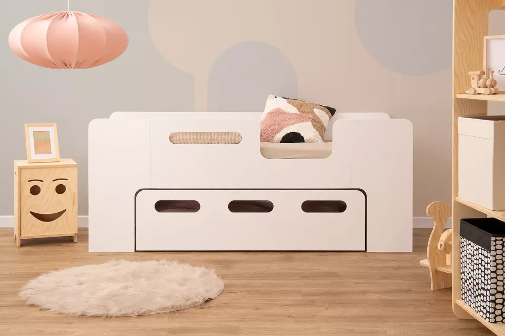 Children's bed with pee drawer